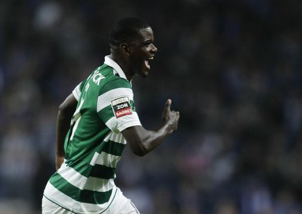 Sporting Lisboa's William Carvalho celebrates his goal against Porto during their Portuguese premier league soccer match at the Dragao stadi Sporting Lisboa's William Carvalho celebrates his goal against Porto during their Portuguese premier league soccer match at the Dragao stadi