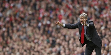 Arsenal manager Arsene Wenger reacts during their English Premier League soccer match against Tottenham Hotspur at the Emirates Stadium in L Arsenal manager Arsene Wenger reacts during their English Premier League soccer match against Tottenham Hotspur at the Emirates Stadium in L