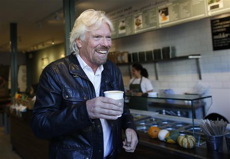 Sir Richard Branson, Founder of Virgin Group, buys a coffee before a seminar about the Virgin StartUp scheme for young entrepreneurs at Box Sir Richard Branson, Founder of Virgin Group, buys a coffee before a seminar about the Virgin StartUp scheme for young entrepreneurs at Box