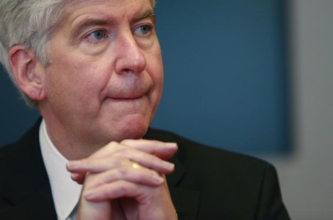 Rick Snyder, the Republican governor of Michigan, listens to a question during an interview in New York, November 8, 2013. REUTERS/Shannon S Rick Snyder, the Republican governor of Michigan, listens to a question during an interview in New York, November 8, 2013. REUTERS/Shannon S