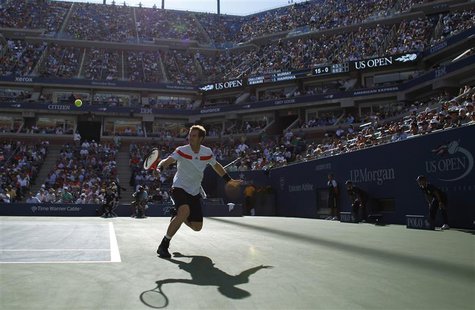 Andy Murray of Britain chases down a return to Stanislas Wawrinka of Switzerland at the U.S. Open tennis championships in New York September Andy Murray of Britain chases down a return to Stanislas Wawrinka of Switzerland at the U.S. Open tennis championships in New York September
