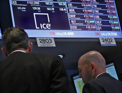Specialist traders work at the booth that trades the stock for IntercontinentalExchange, on the floor at the New York Stock Exchange, May 1, Specialist traders work at the booth that trades the stock for IntercontinentalExchange, on the floor at the New York Stock Exchange, May 1,