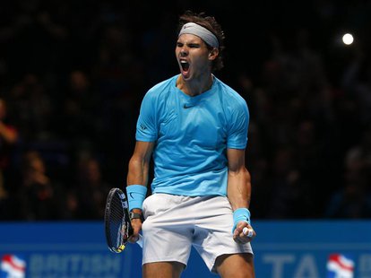 Rafael Nadal of Spain celebrates winning his match against Tomas Berdych of the Czech Republic during their men's singles tennis match at th Rafael Nadal of Spain celebrates winning his match against Tomas Berdych of the Czech Republic during their men's singles tennis match at th