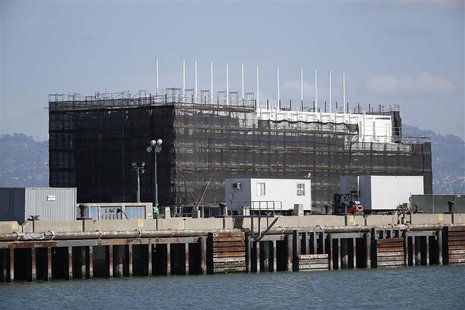 A barge built with four levels of shipping containers is seen at Pier 1 at Treasure Island in San Francisco, California in this file photo t A barge built with four levels of shipping containers is seen at Pier 1 at Treasure Island in San Francisco, California in this file photo t