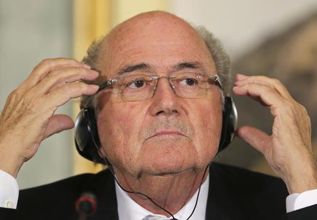 FIFA President Sepp Blatter speaks during a news conference in Doha November 9, 2013. REUTERS/Fadi Al-Assaad FIFA President Sepp Blatter speaks during a news conference in Doha November 9, 2013. REUTERS/Fadi Al-Assaad
