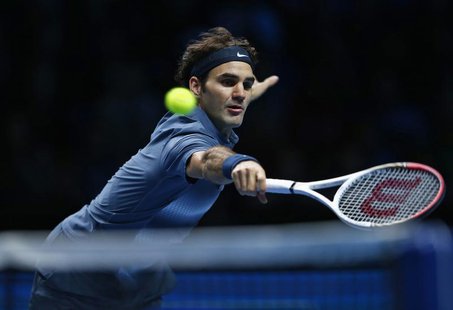 Roger Federer of Switzerland hits a return during his men's singles tennis match against Juan Martin Del Potro of Argentina at the ATP World Roger Federer of Switzerland hits a return during his men's singles tennis match against Juan Martin Del Potro of Argentina at the ATP World
