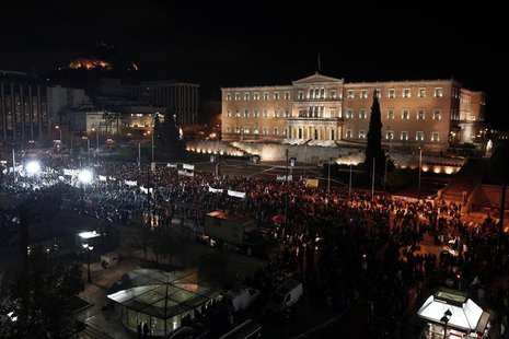 Supporters of the leftist main opposition Syriza party take part in an anti-government rally in front of the parliament in Athens November 1 Supporters of the leftist main opposition Syriza party take part in an anti-government rally in front of the parliament in Athens November 1