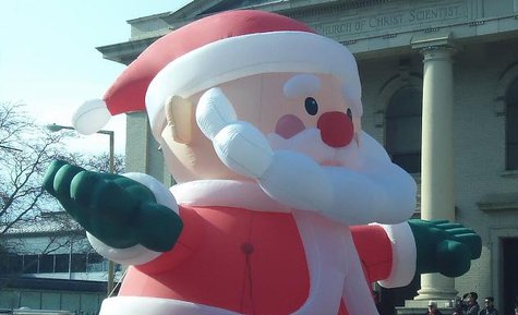 Santa balloon heading north on Park St. past Bronson Park. Santa balloon heading north on Park St. past Bronson Park.