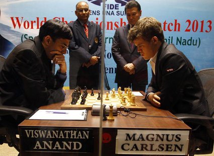Norway's Magnus Carlsen (R) plays against India's Viswanathan Anand during the FIDE World Chess Championship in the southern Indian city of Norway's Magnus Carlsen (R) plays against India's Viswanathan Anand during the FIDE World Chess Championship in the southern Indian city of