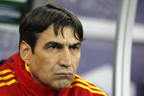Romania's coach Victor Piturca looks at his players before their 2014 World Cup Group D qualifying soccer match against Estonia at the Natio Romania's coach Victor Piturca looks at his players before their 2014 World Cup Group D qualifying soccer match against Estonia at the Natio