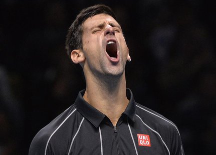 Novak Djokovic of Serbia reacts after breaking the serve of Rafael Nadal of Spain during their men's final singles tennis match at the ATP W Novak Djokovic of Serbia reacts after breaking the serve of Rafael Nadal of Spain during their men's final singles tennis match at the ATP W