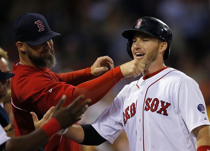 Boston Red Sox's David Ross (L) pulls on the beard of teammate Stephen Drew after Drew hit a two-run, home run against the Baltimore Orioles Boston Red Sox's David Ross (L) pulls on the beard of teammate Stephen Drew after Drew hit a two-run, home run against the Baltimore Orioles