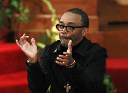 Filmmaker Spike Lee claps during a community memorial service at the 16th Street Baptist Church in Birmingham, Alabama September 15, 2013. R Filmmaker Spike Lee claps during a community memorial service at the 16th Street Baptist Church in Birmingham, Alabama September 15, 2013. R