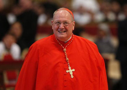 Cardinal Timothy Michael Dolan of the U.S. attends a mass in St. Peter's Basilica at the Vatican March 12, 2013. REUTERS/Stefano Rellandini Cardinal Timothy Michael Dolan of the U.S. attends a mass in St. Peter's Basilica at the Vatican March 12, 2013. REUTERS/Stefano Rellandini