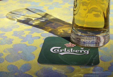 Carlsberg's company logo is pictured on a coaster in the bar in Riga, May 6, 2013. REUTERS/Ints Kalnins Carlsberg's company logo is pictured on a coaster in the bar in Riga, May 6, 2013. REUTERS/Ints Kalnins