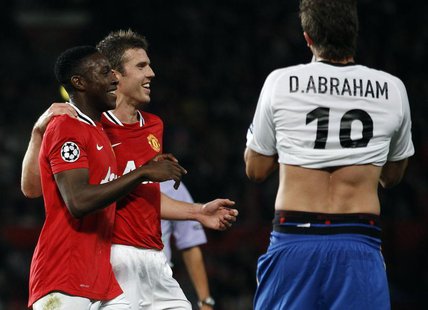 Manchester United's Danny Welbeck (L) celebrates scoring a goal with Michael Carrick against FC Basel during their Champions League Group C Manchester United's Danny Welbeck (L) celebrates scoring a goal with Michael Carrick against FC Basel during their Champions League Group C