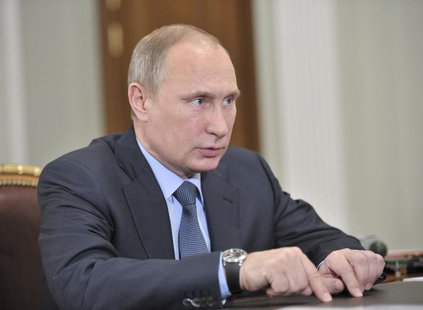 Russian President Vladimir Putin attends a meeting with Vyacheslav Gaizer (not pictured), the Head of the Republic of Komi, at the Novo-Ogar Russian President Vladimir Putin attends a meeting with Vyacheslav Gaizer (not pictured), the Head of the Republic of Komi, at the Novo-Ogar