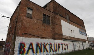 The word "Bankruptcy" is painted on the side of a building in Detroit, Michigan October 25, 2013. REUTERS/Joshua Lott The word "Bankruptcy" is painted on the side of a building in Detroit, Michigan October 25, 2013. REUTERS/Joshua Lott