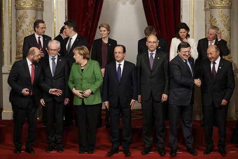 French President Francois Hollande (C) and EU head of states including German Chancellor Angela Merkel (first row,3rdL), Italian Prime Minis French President Francois Hollande (C) and EU head of states including German Chancellor Angela Merkel (first row,3rdL), Italian Prime Minis