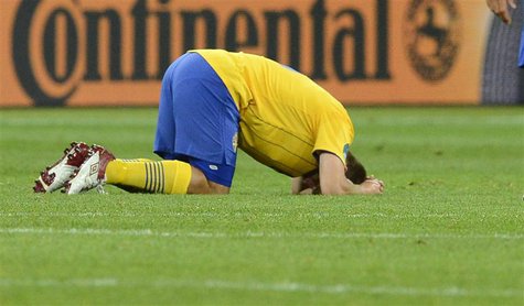 Sweden's Anders Svensson reacts to his team's defeat by England during their Group D Euro 2012 soccer match at the Olympic Stadium in Kiev, Sweden's Anders Svensson reacts to his team's defeat by England during their Group D Euro 2012 soccer match at the Olympic Stadium in Kiev,