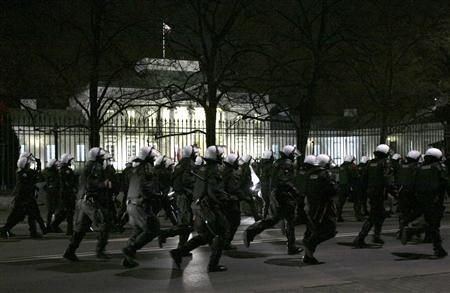 Riot policemen run to disperse far-right protesters during the annual far-right march, which coincides with Poland's national Independence Day in Warsaw November 11, 2013.
CREDIT: REUTERS/KACPER PEMPEL Riot policemen run to disperse far-right protesters during the annual far-right march, which coincides with Poland's national Independence Day in Warsaw November 11, 2013.
CREDIT: REUTERS/KACPER PEMPEL