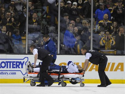 Boston, MA, USA; Tampa Bay Lightning center Steven Stamkos (91) is wheeled off on a stretcher during the second period against the Boston Br Boston, MA, USA; Tampa Bay Lightning center Steven Stamkos (91) is wheeled off on a stretcher during the second period against the Boston Br