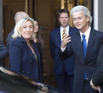 Netherland's anti-Islamic party leader Geert Wilders (R) welcomes far-right leader Marine Le Pen of France in The Hague, Netherlands, Novemb Netherland's anti-Islamic party leader Geert Wilders (R) welcomes far-right leader Marine Le Pen of France in The Hague, Netherlands, Novemb