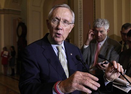 U.S. Senate Majority Leader Harry Reid (D-NV) (L) speaks to the media about healthcare on Capitol Hill in Washington October 29, 2013. REUTE U.S. Senate Majority Leader Harry Reid (D-NV) (L) speaks to the media about healthcare on Capitol Hill in Washington October 29, 2013. REUTE