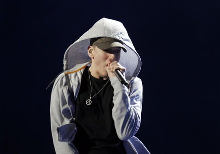 U.S. rapper Eminem performs during the Abu Dhabi F1 Grand Prix After Race closing concert at the du Arena on Yas Island November 4, 2012. RE U.S. rapper Eminem performs during the Abu Dhabi F1 Grand Prix After Race closing concert at the du Arena on Yas Island November 4, 2012. RE