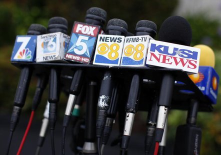 Microphones from San Diego media and news outlets are gathered for a news conference in San Diego July 11, 2013. REUTERS/Mike Blake Microphones from San Diego media and news outlets are gathered for a news conference in San Diego July 11, 2013. REUTERS/Mike Blake