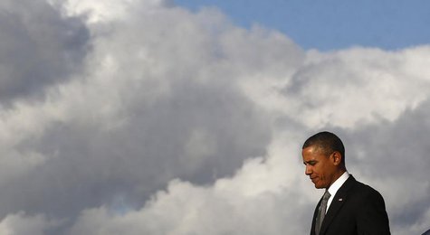 U.S. President Barack Obama arrives aboard Air Force One at Miami International Airport in Florida, November 8, 2013. REUTERS/Larry Downing U.S. President Barack Obama arrives aboard Air Force One at Miami International Airport in Florida, November 8, 2013. REUTERS/Larry Downing