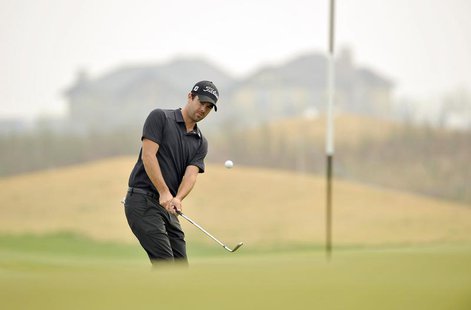 Nick Cullen of Australia watches his shot during the Championship Pro-Am of Volvo China Open at Binhai Lake Golf Club in Tianjin April 18, 2 Nick Cullen of Australia watches his shot during the Championship Pro-Am of Volvo China Open at Binhai Lake Golf Club in Tianjin April 18, 2