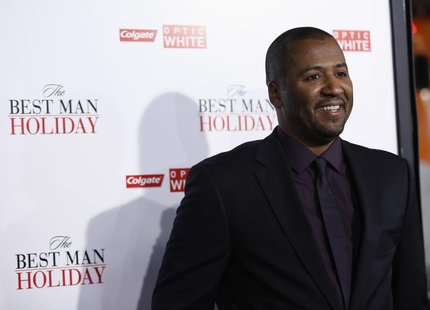 Director of the movie Malcolm D. Lee poses at the premiere of "The Best Man Holiday" in Hollywood, California November 5, 2013. The movie op Director of the movie Malcolm D. Lee poses at the premiere of "The Best Man Holiday" in Hollywood, California November 5, 2013. The movie op