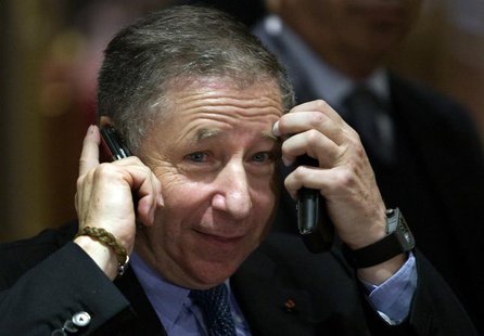 Former Ferrari team boss Jean Todt speaks on his mobile phone after being elected as new International Automobile Federation (FIA) president Former Ferrari team boss Jean Todt speaks on his mobile phone after being elected as new International Automobile Federation (FIA) president