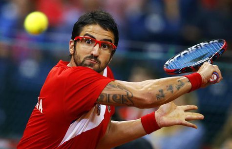 Serbia's Janko Tipsarevic returns the ball to Canada's Vasek Pospisil during their Davis Cup semi-final tennis match in Belgrade September 1 Serbia's Janko Tipsarevic returns the ball to Canada's Vasek Pospisil during their Davis Cup semi-final tennis match in Belgrade September 1