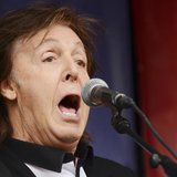 Singer Paul McCartney performs during an impromptu concert to promote his album "New" at Covent Garden in London October 18, 2013. REUTERS/P Singer Paul McCartney performs during an impromptu concert to promote his album "New" at Covent Garden in London October 18, 2013. REUTERS/P