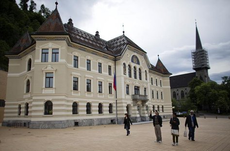 People walk in front of Liechtenstein's government building in Vaduz, May 15, 2013. REUTERS/Michael Buholzer People walk in front of Liechtenstein's government building in Vaduz, May 15, 2013. REUTERS/Michael Buholzer
