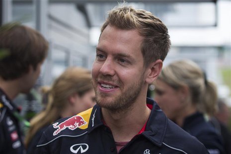 Red Bull Formula One driver Sebastian Vettel of Germany arrives at the Circuit of the Americas in Austin, Texas November 14, 2013. REUTERS/A Red Bull Formula One driver Sebastian Vettel of Germany arrives at the Circuit of the Americas in Austin, Texas November 14, 2013. REUTERS/A