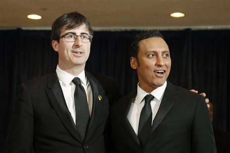 Comedians John Oliver (L) and Aasif Mandvi arrive on the red carpet at the annual White House Correspondents' Association dinner in Washingt Comedians John Oliver (L) and Aasif Mandvi arrive on the red carpet at the annual White House Correspondents' Association dinner in Washingt