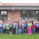 James Madison Elementary School third grade students show off their new dictionaries.
James Madison Elementary School third grade students show off their new dictionaries.