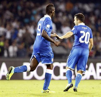 Italy's Mario Balotelli (L) celebrates with Giuseppe Rossi after scoring against Armenia during their 2014 World Cup qualifying soccer match Italy's Mario Balotelli (L) celebrates with Giuseppe Rossi after scoring against Armenia during their 2014 World Cup qualifying soccer match