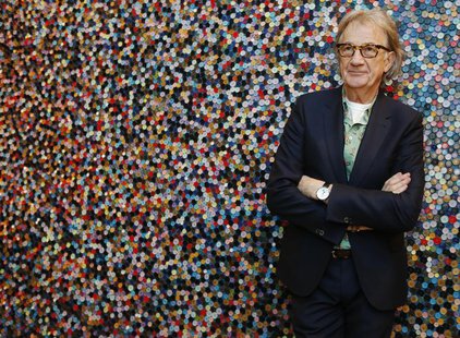 Fashion designer Paul Smith poses after an interview with Reuters at the media launch of the exhibition "Hello, My Name is Paul Smith", at t Fashion designer Paul Smith poses after an interview with Reuters at the media launch of the exhibition "Hello, My Name is Paul Smith", at t