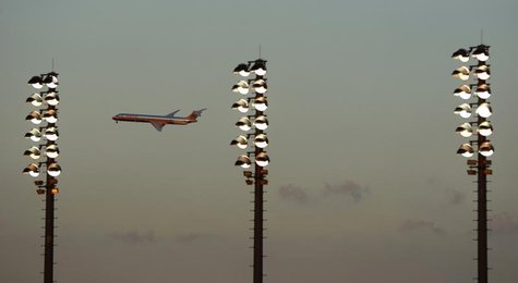 An American Airlines McDonnell Douglas MD-80 series passenger jet flies over the stadiums during the U.S. Open tennis tournament in New York An American Airlines McDonnell Douglas MD-80 series passenger jet flies over the stadiums during the U.S. Open tennis tournament in New York