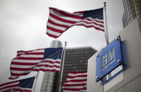 Flags wave behind a General Motors Corp sign in downtown in Detroit May 28, 2009. REUTERS/Mark Blinch Flags wave behind a General Motors Corp sign in downtown in Detroit May 28, 2009. REUTERS/Mark Blinch