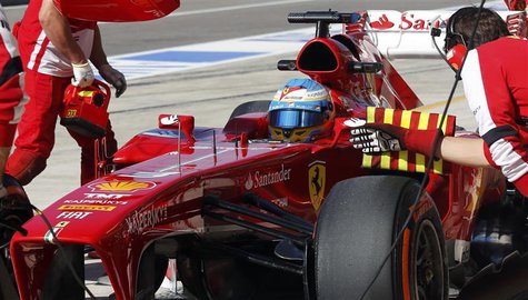 Ferrari Formula One driver Fernando Alonso of Spain is attended to by his crew during the first practice session of the Austin F1 Grand Prix Ferrari Formula One driver Fernando Alonso of Spain is attended to by his crew during the first practice session of the Austin F1 Grand Prix