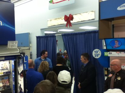 Guests check in their cameras and cellphones at the door before meeting Sarah Palin Guests check in their cameras and cellphones at the door before meeting Sarah Palin