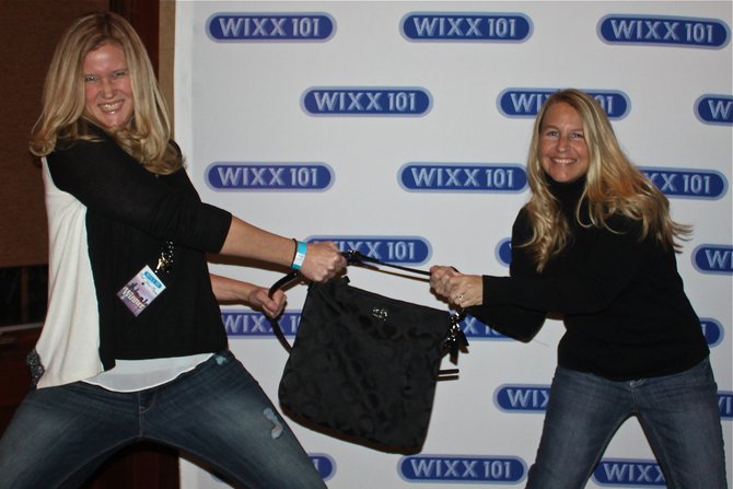 These ladies had to be separated by security...MY PURSE!!