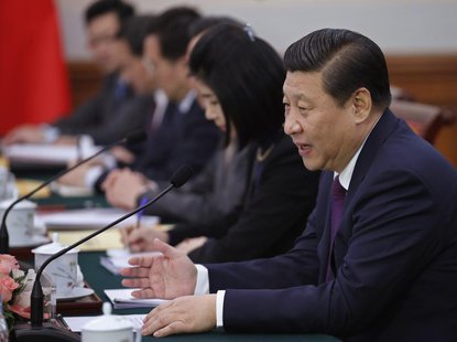 China's President Xi Jinping (R) speaks as he attends a bilateral meeting with the Netherlands' Prime Minister Mark Rutte (not pictured) at China's President Xi Jinping (R) speaks as he attends a bilateral meeting with the Netherlands' Prime Minister Mark Rutte (not pictured) at