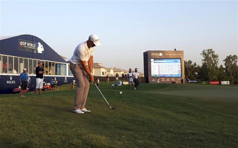 Henrik Stenson of Sweden chips a ball onto the 18th green during the third round of the DP World Tour Championship in Dubai November 16, 201 Henrik Stenson of Sweden chips a ball onto the 18th green during the third round of the DP World Tour Championship in Dubai November 16, 201