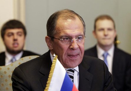 Russia's Foreign Minister Sergei Lavrov (C) meets with Egypt's Foreign Minister Nabil Fahmy (not pictured) in Cairo November 14, 2013. REUTE Russia's Foreign Minister Sergei Lavrov (C) meets with Egypt's Foreign Minister Nabil Fahmy (not pictured) in Cairo November 14, 2013. REUTE